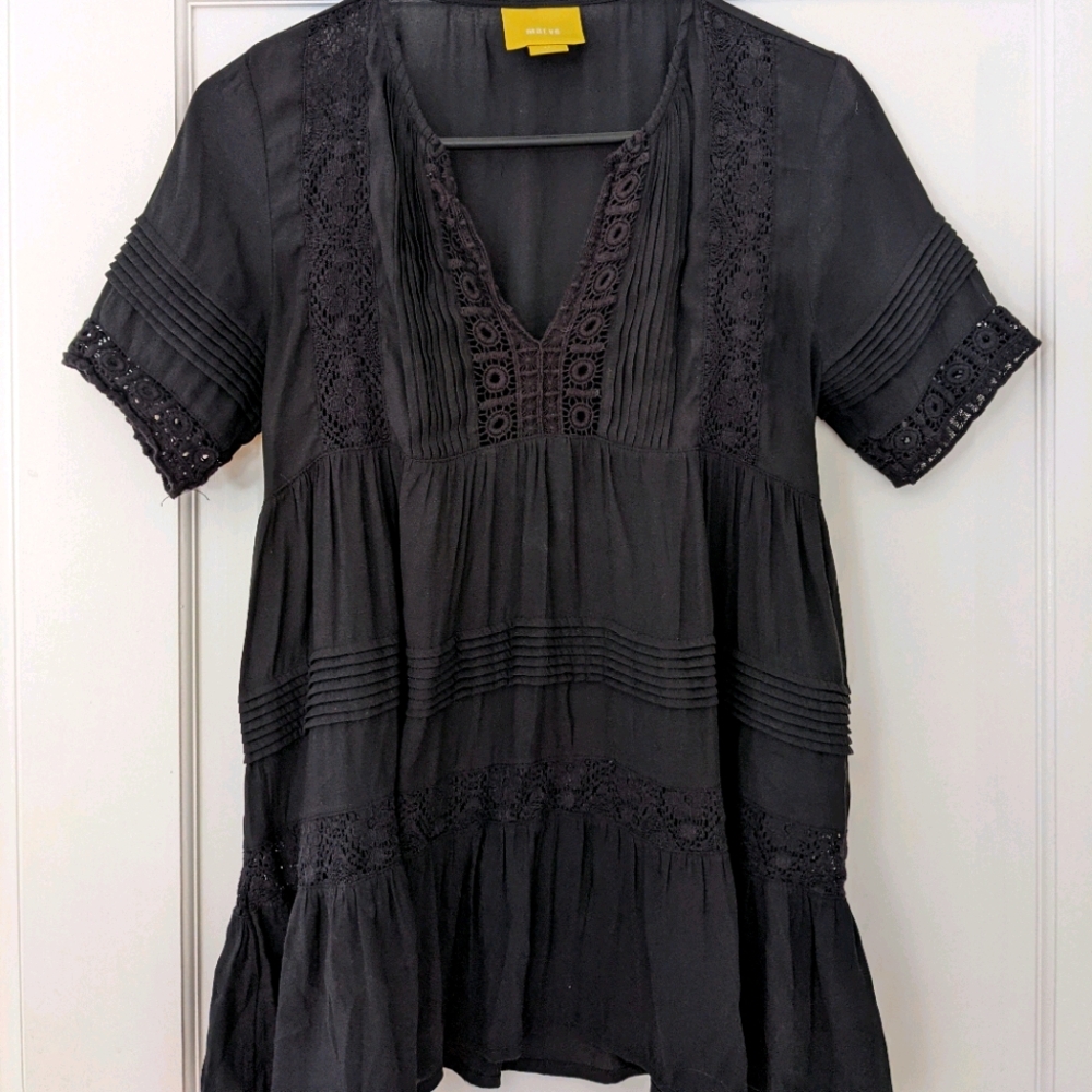 Maeve black tunic sold by Anthropologie XS
